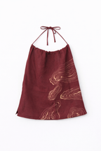 Red halter top in Maroon with abstract patterns on a white background