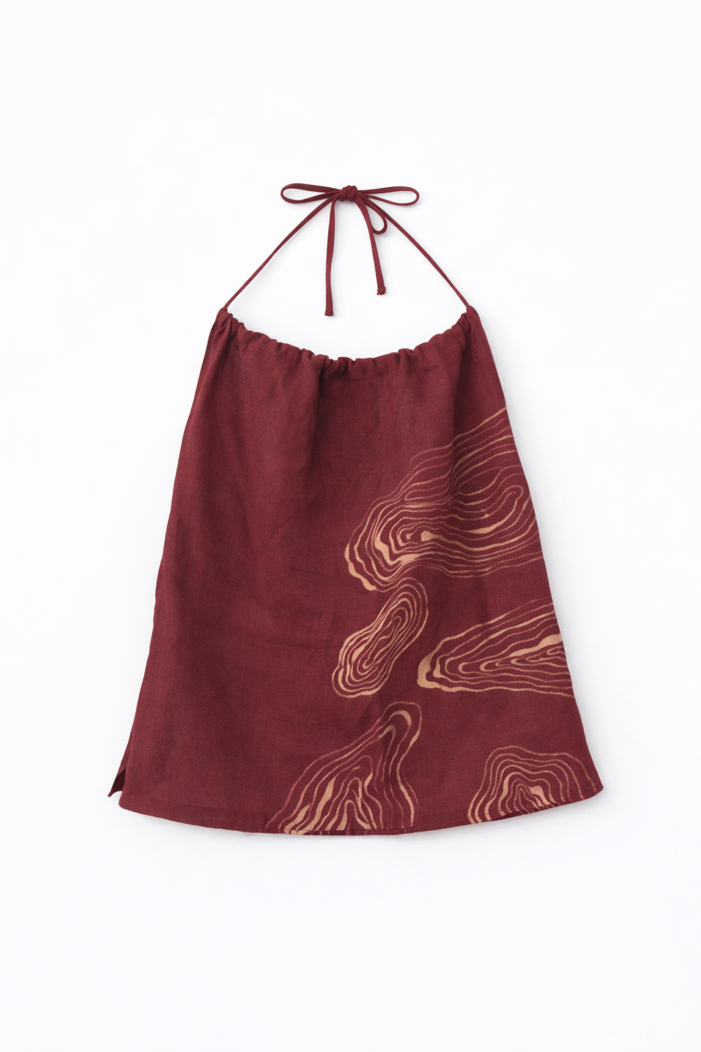 Red halter top in Maroon with abstract patterns on a white background