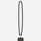 A dark brown leather phone case with a matching dark blue denim braided lanyard strap, shown against a light gray background.