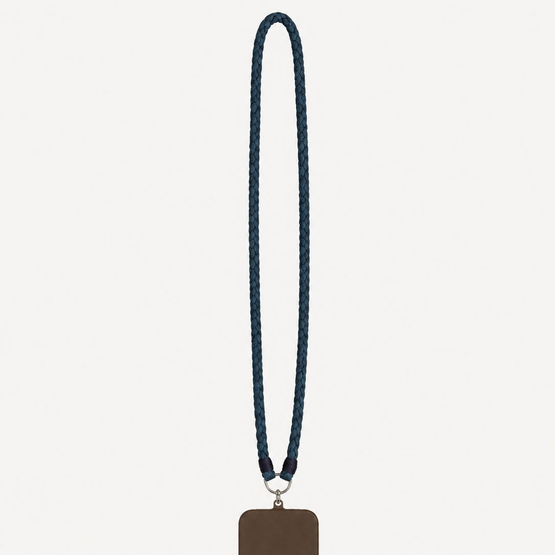 A dark brown leather phone case with a matching dark blue denim braided lanyard strap, shown against a light gray background.