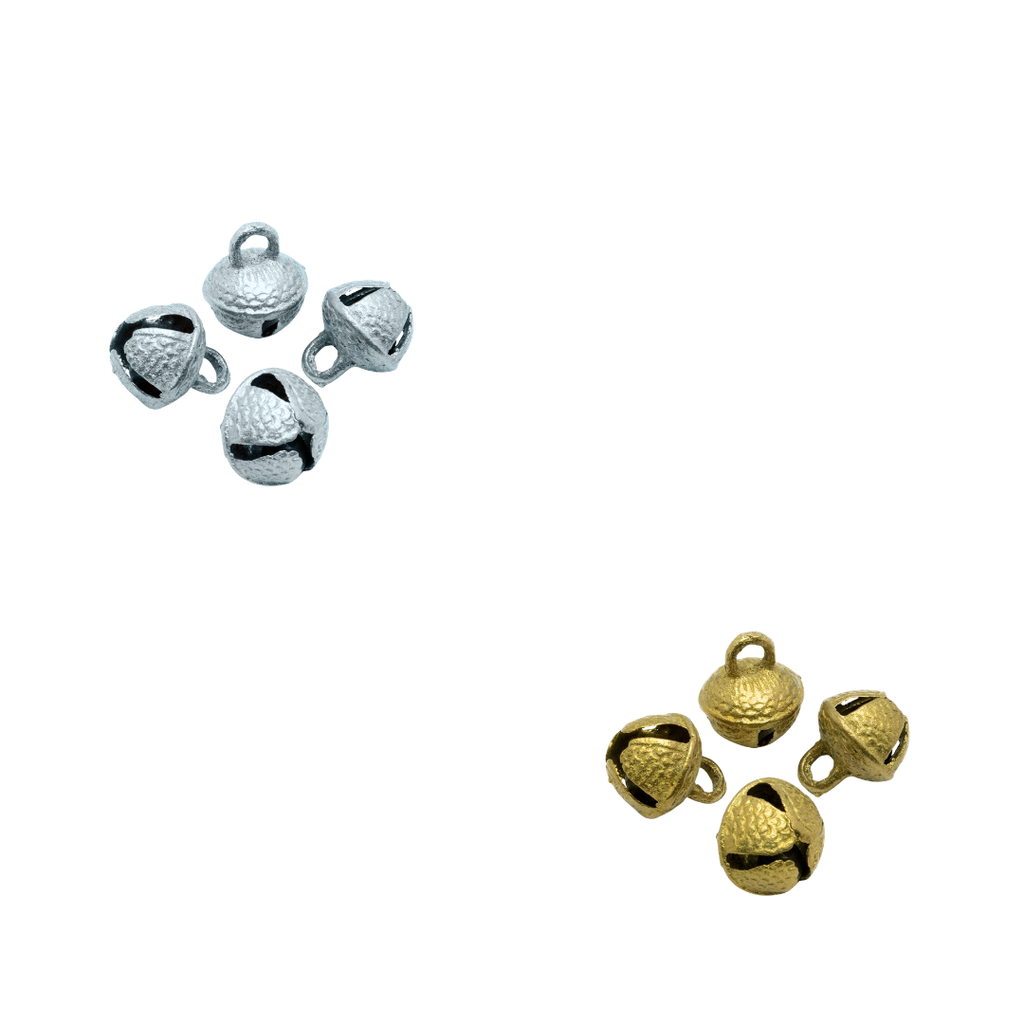 Silver and gold bell charms on a white background
