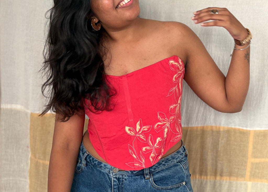 Cherry red floral embroidered corset top with strapless design, inclusive corset blouse suitable for both regular and plus size styling.