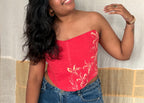 Cherry red floral embroidered corset top with strapless design, inclusive corset blouse suitable for both regular and plus size styling.