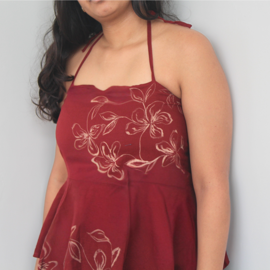 Pure cotton halter top with floral design detail, breathable summer top styled for casual outings.