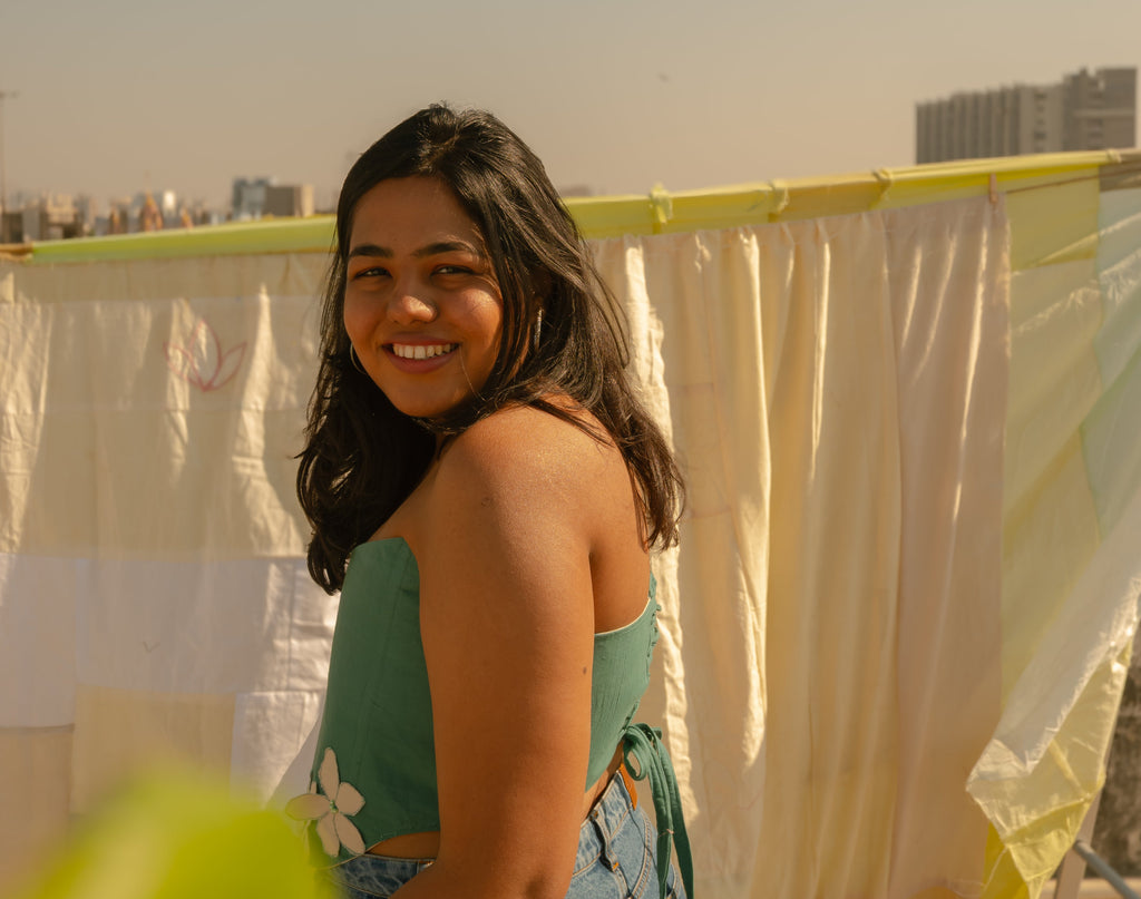 Green floral corset top with white flower details, strapless cotton corset top for summer styling and vacations.