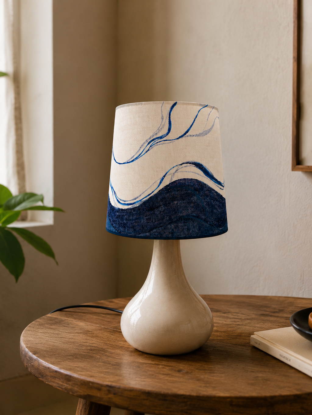 Table lamp with a decorative shade on a wooden table