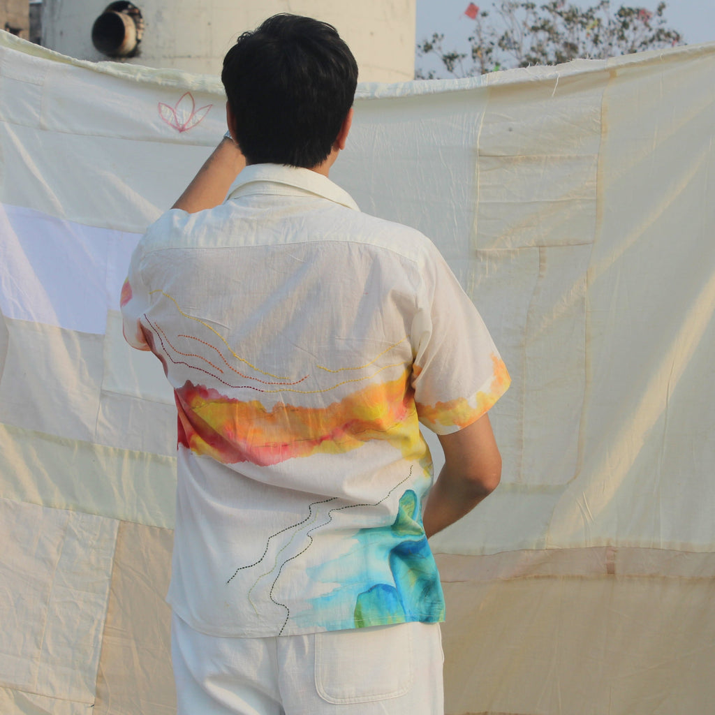 Men wearing a lightweight hand painted vacation shirt for summer, relaxed fit beach shirt for men with artistic color details.