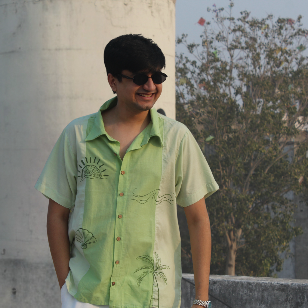 Green casual wear shirt with palm tree and beach painted design  