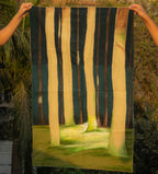 Hand painted textile wall art depicting a forest scene with tall trees and soft landscape tones, statement fabric wall decor for living rooms and studios.