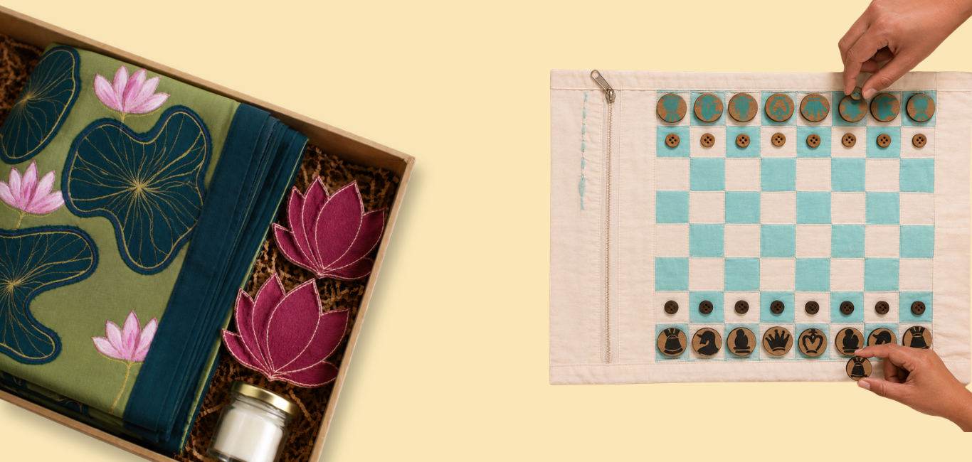 A styled flat-lay product presentation showing a folded embroidered textile gift set on the left and a matching embroidered chess board with pieces on the right, arranged on a pale yellow background. Human hands are visible interacting with the chess board, which classifies the subject_type as Lifestyle under the schema rules.