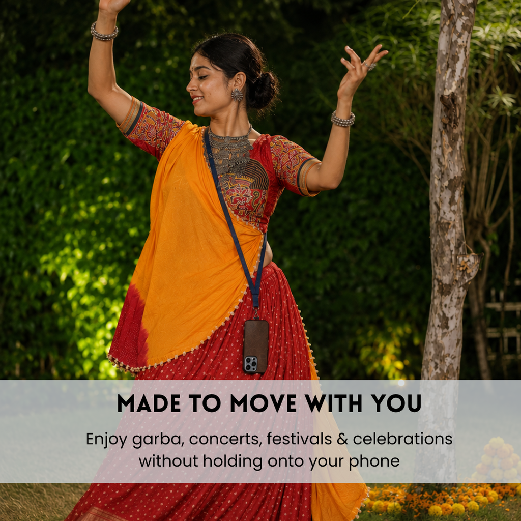 A woman in a traditional Indian outfit with a bright orange and red saree is dancing outdoors in a garden setting. A semi-transparent banner at the bottom reads 'MADE TO MOVE WITH YOU' and 'Enjoy garba, concerts, festivals & celebrations without holding onto your phone'.