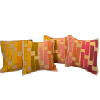 Four woven patterned pillows covers
