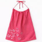 Pink sleeveless cotton top with floral detail, comfortable summer top for casual outings and travel.
