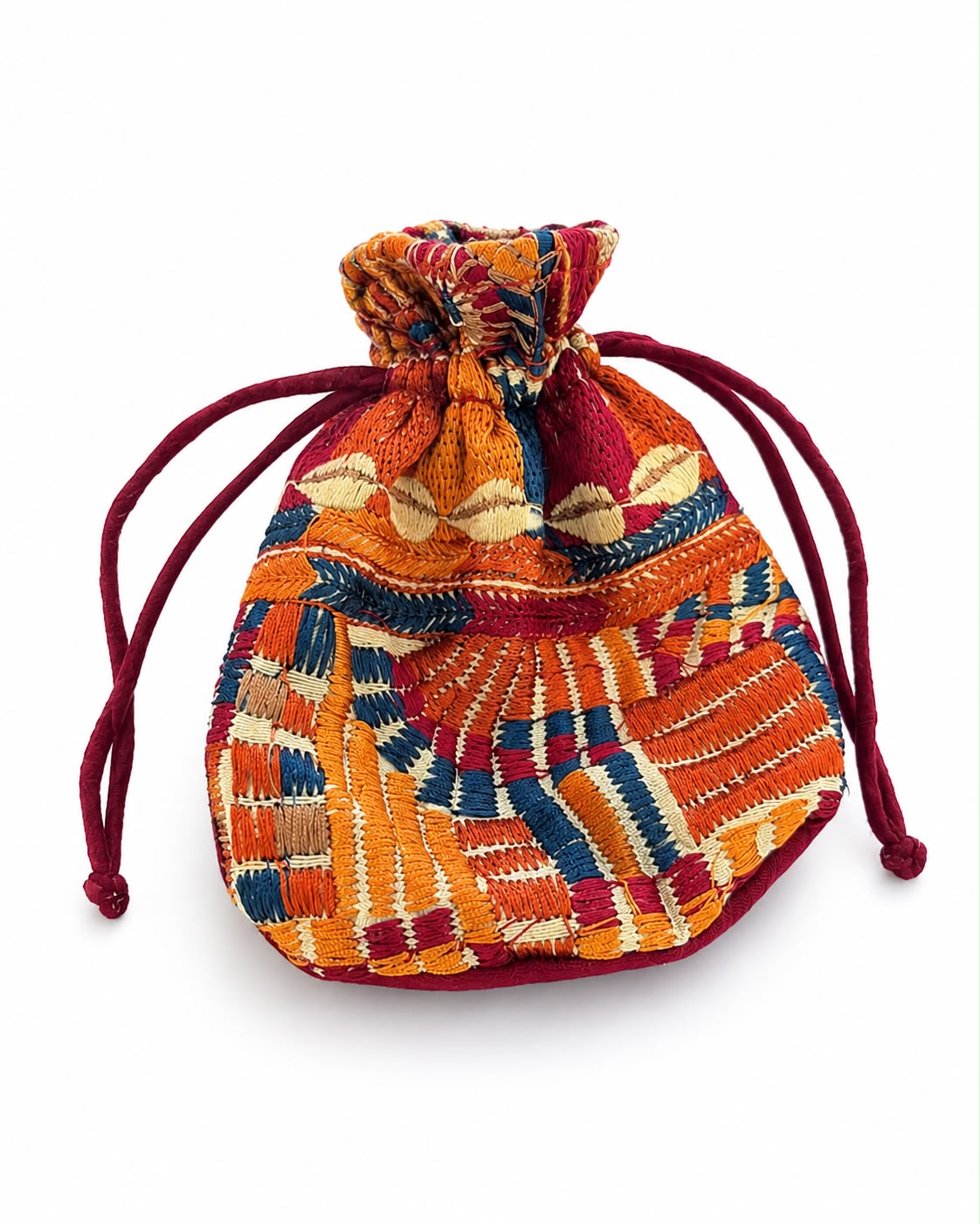 A small drawstring pouch made of woven textile fabric with a multicolor geometric pattern in orange, red, blue, and cream, featuring dark red drawstring cords, shown on a white background.