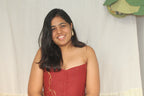 Strapless rust red corset top with gold detail design, stylish party corset blouse for festive occasions and saree looks.