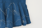 Blue cotton halter summer top inspired by the flowing movement of starry night, featuring stitched swirl detailing and a relaxed silhouette for warm weather outfits.
