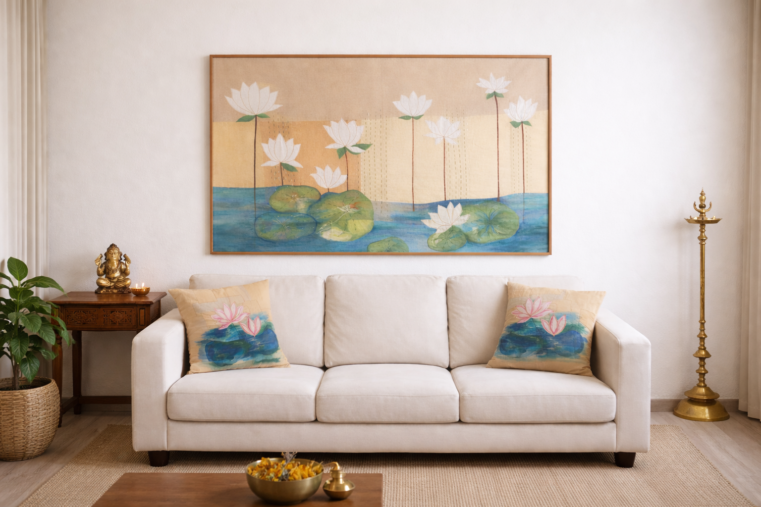 Living room with a white sofa, decorative pillows, and a large wall textile artwork of lotuses