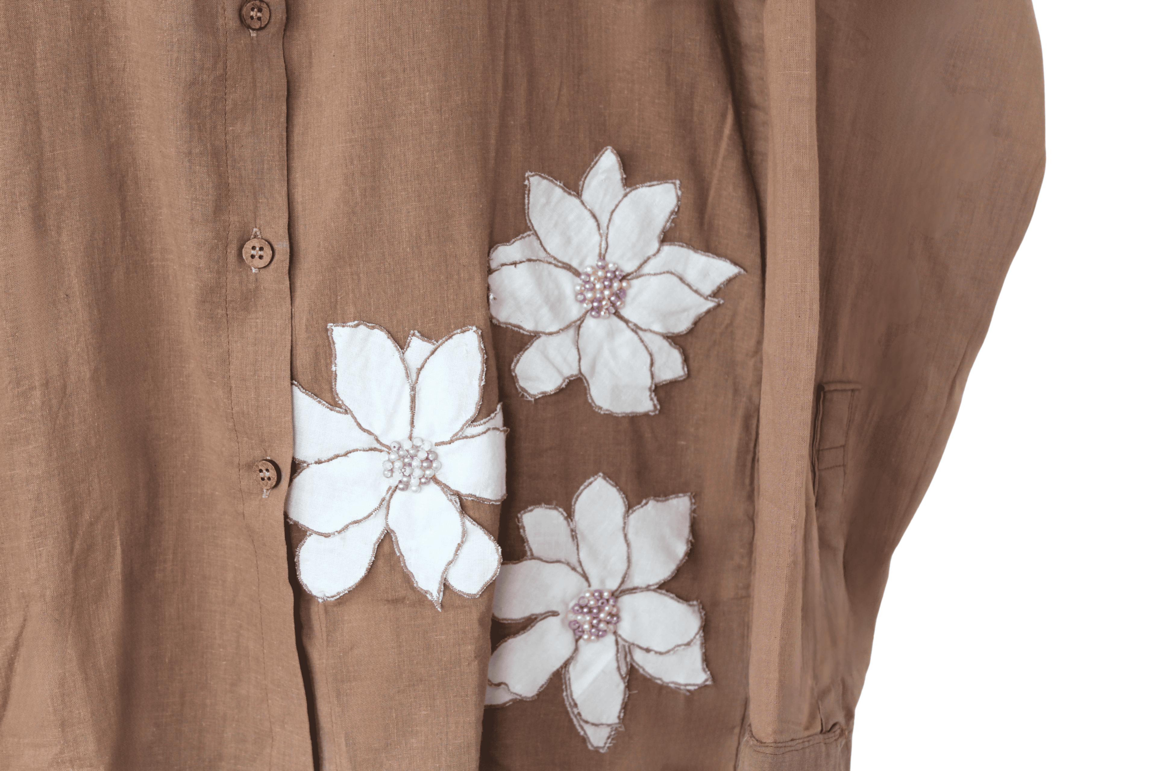 Brown shirt with white floral patterns, beaded details