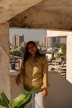 Woman wearing a relaxed fit pure cotton shirt for women, breathable casual shirt perfect for everyday styling and summer wear.