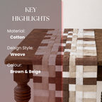 Woven cotton table runner on a wooden table with material, design style, and color details.